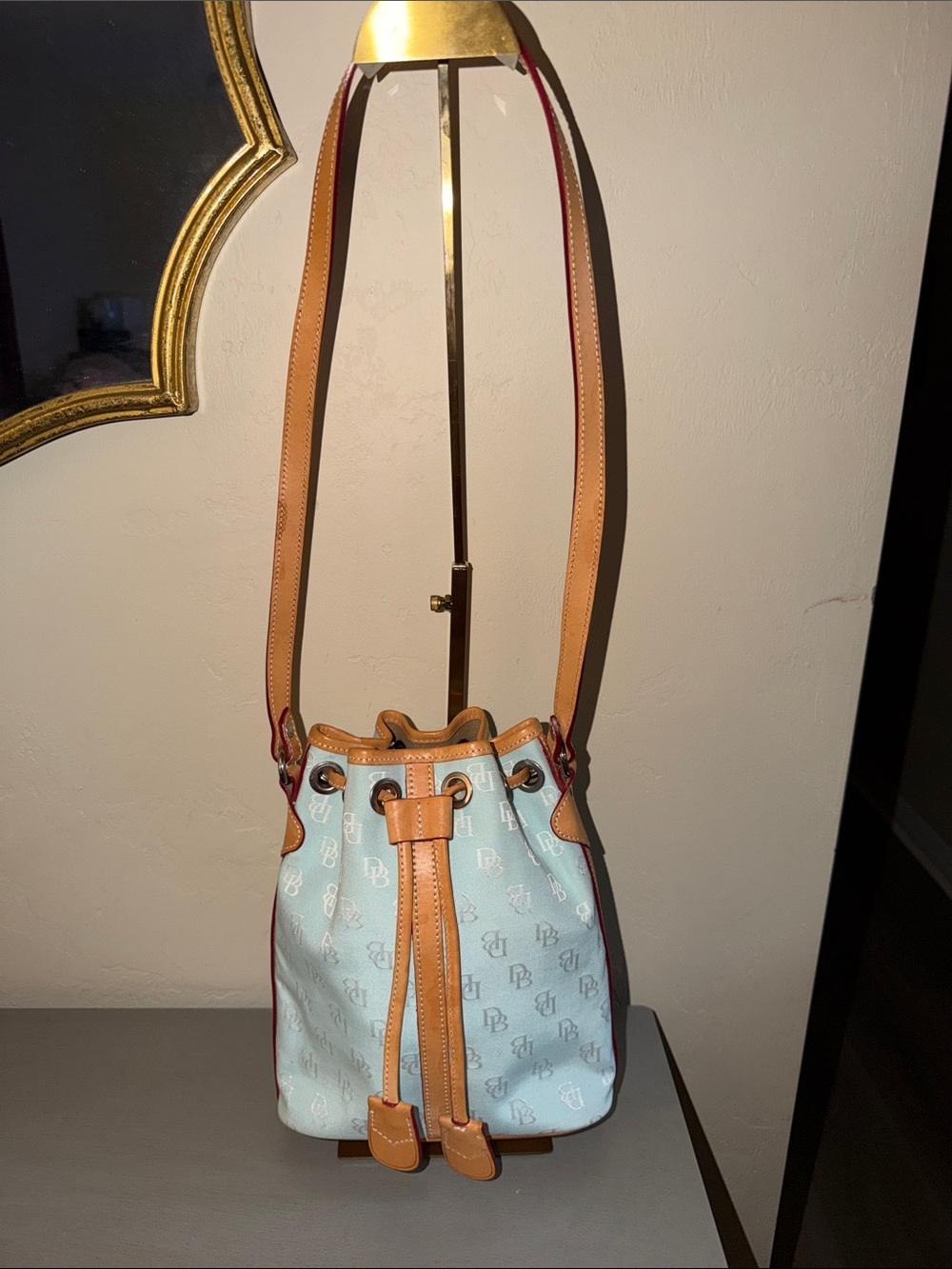 Dooney & Bourke Light Blue Canvas Drawstring Bucket Bag with Tan Trim